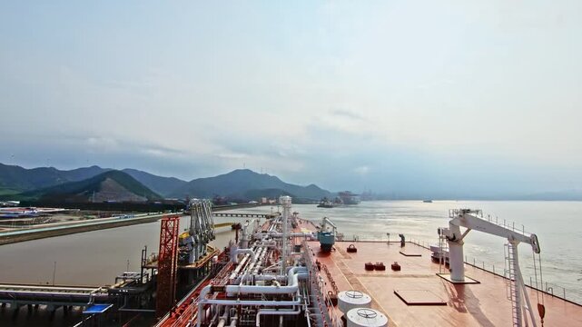 LNG VESSEL AT TERMINAL DURING CARGO OPERATION 