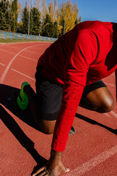 Unknown sprinter methodically refining his launch position