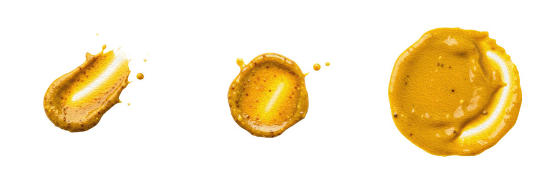 Set of mustard sauce smears and dollops isolated on white background