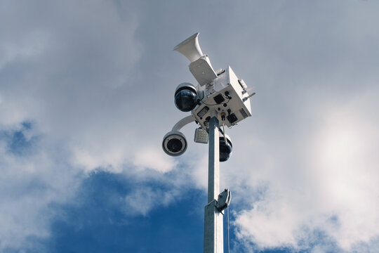 Surveillance Camera System Mounted on a Tall Pole in the Sky