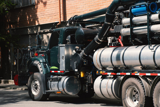 Truck Parked on City Street During Daylight