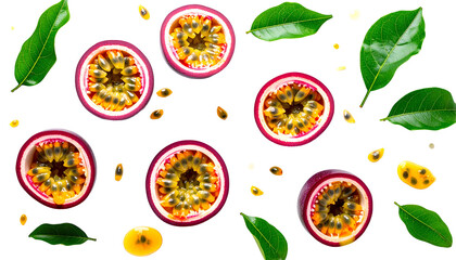 Overhead shot of passion fruit slices, seeds, and leaves against a black background
