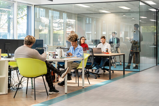Diverse business professionals collaborating in a modern office