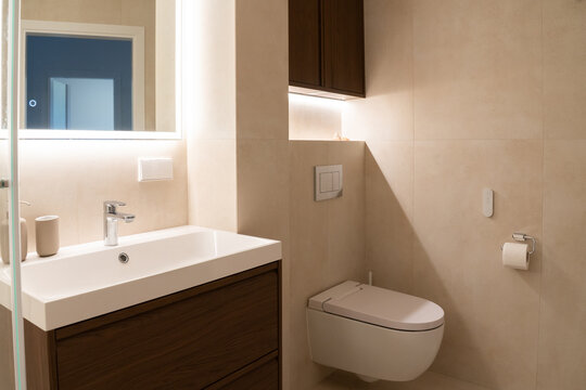 Modern Bathroom Design With Sink and Smart Toilet 