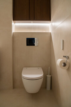 Modern Bathroom Design With Smart Toilet and Storage Space
