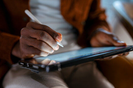 Person using a tablet to draw
