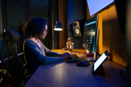 Working long hours at a computer desk
