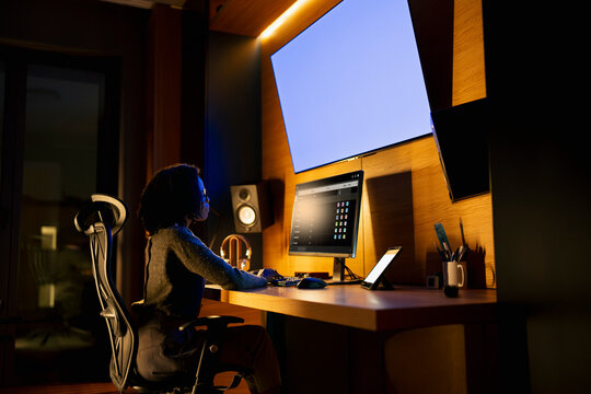 Working late at a home office setup
