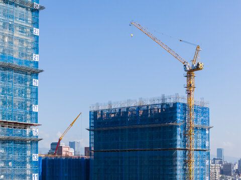 Tower Crane At High Rise Construction Site Blue Sky