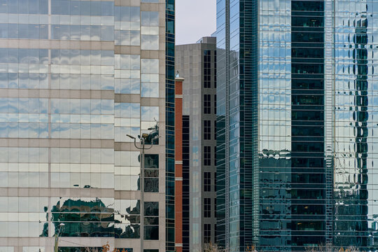 Reflections on Modern Glass Facades in Calgary Downtown