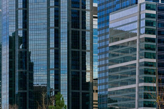 Reflections on Modern Glass Facades in Calgary Downtown