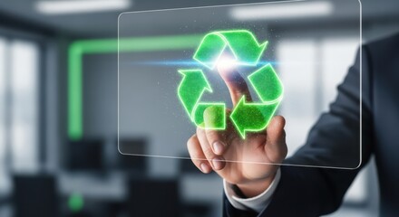 Business hand touching a recycling symbol on a green holographic interface to represent corporate sustainability and eco friendly practices.