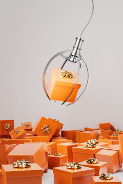 3D render of open claw above scattered orange gift boxes