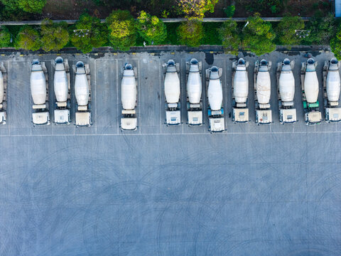 Aerial View of Cement Mixer Trucks Parked in Rows