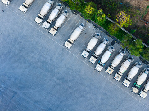 Aerial View of Cement Mixer Trucks Parked in Rows