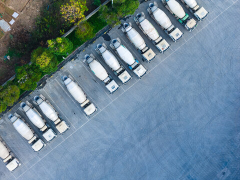 Aerial View of Cement Mixer Trucks Parked in Rows