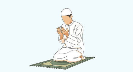 A Muslim man in white attire kneels on a prayer mat with hands clasped in front of him, engaged in congregational prayer during Ramadan.