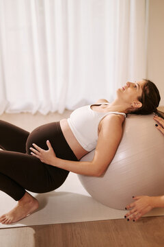 Pregnant woman doing exercises