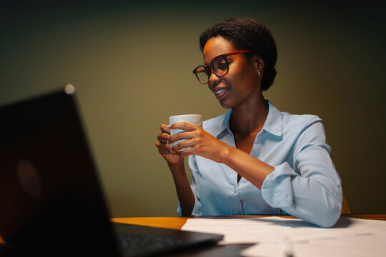 Working late at night with coffee
