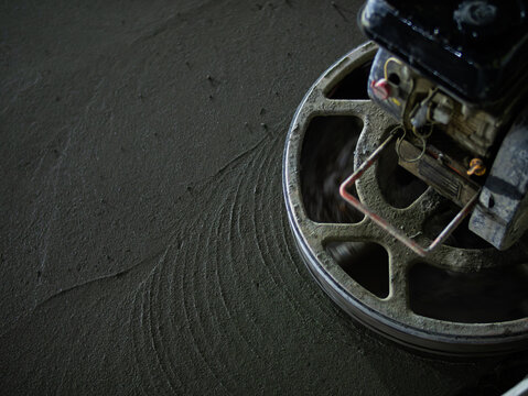 Concrete floor trowel machine smoothing surface