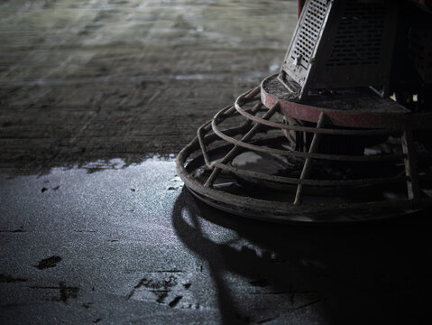 Concrete floor polishing machine in operation
