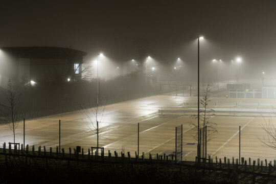 Industrial estate and car park on a foggy winters night