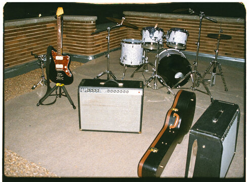Musical instruments arranged on a ceiling for a performance
