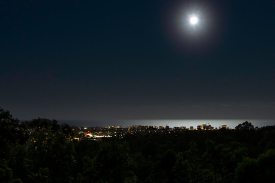 Moonlight over Queensland beach on a dark night