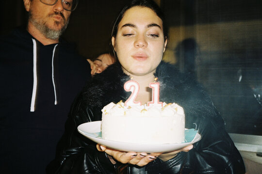 Blowing birthday candles
