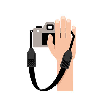 Hand holding camera with strap, isolated on white background