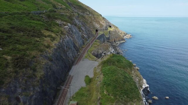 High angle shot of a train track on a cliffside.