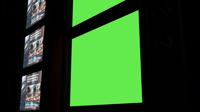 Dark interior scene with blank green screen window mockup, perfect for advertising, presentation, chroma, mockup, media replacement content.
