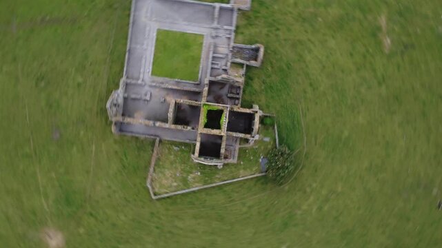Elevated view of stone ruins showing interior structure.