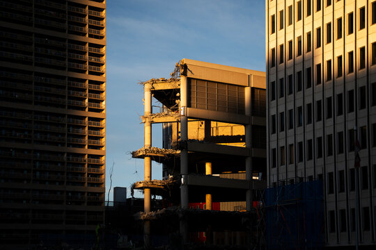 Building Demolition During Sunset in Urban Area