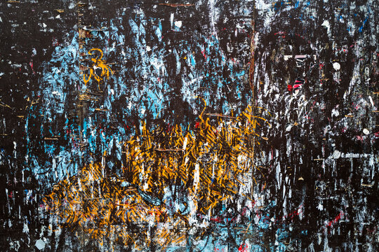 Colorful Abstract Artwork With Blue and Orange Hues on Black Surface