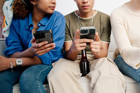 Friends using smartphones together
