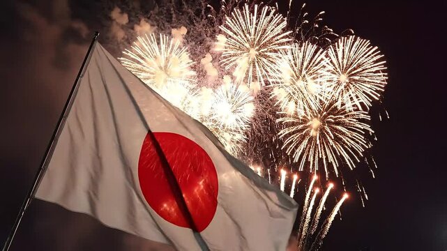 Fireworks Explode Behind Waving Japanese Flag at Nighttime Celebration