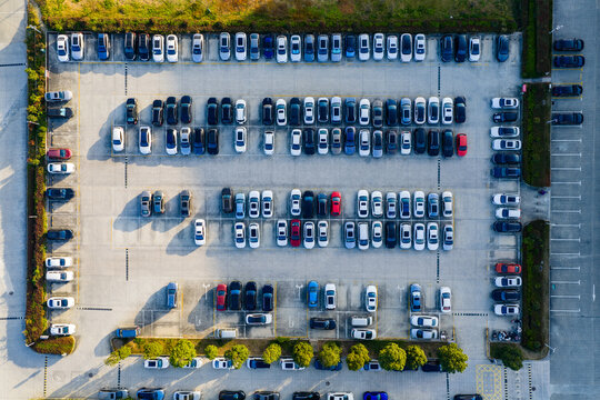 Top-Down View of Full Parking Lot with Colorful Cars

