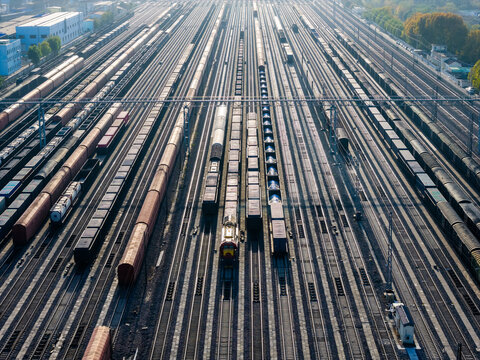 Aerial View of Railway Yard with Dozens of Train Tracks

