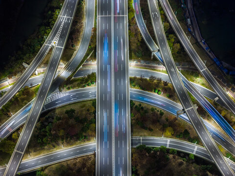 Aerial View of Interconnected Highway Overpasses at Dusk

