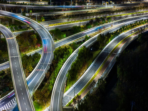 Aerial View of Interconnected Highway Overpasses at Dusk

