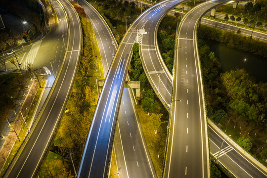 Aerial View of Interconnected Highway Overpasses at Dusk

