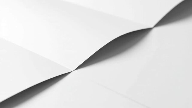 Pastel Gradient Layers Overhead shot of overlapping pastel colored paper sheets with diffused light creating smooth, evolving shadow transitions.