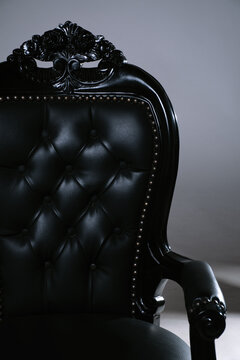 Black Chair With Detailed Design in a Simple Setting