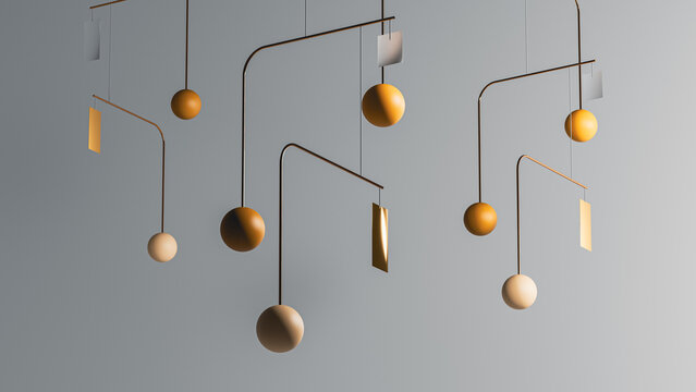 Decorative mobile hangs from the ceiling in modern interior space