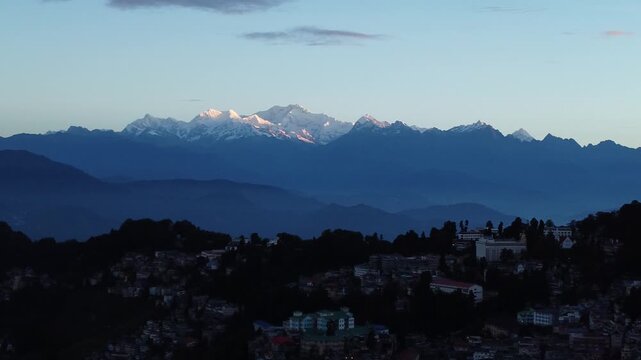 Kanchenjunga mountain is visible at the end of the hill.