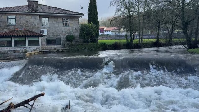 Homes at risk during high water levels caused by Storm Kristin in Portugal.