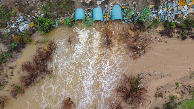 drainage of water into a creek after a heavy rain