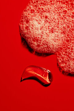 Bright Red Surface With Bubbles and a Red Object
