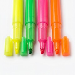 Set of four colorful fluorescent highlighter pens isolated on white.